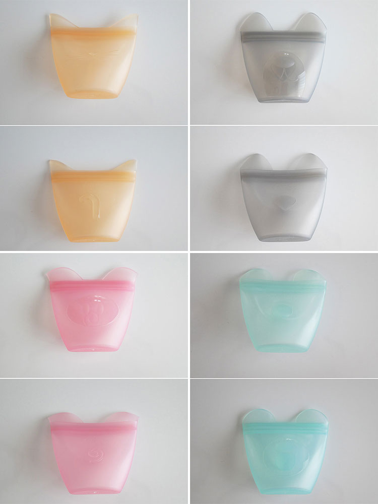 Zip Topブランドのベビースナック用シリコーン製ジップトップ容器。透明な蓋が特徴で、食品を安全に保存できるデザイン