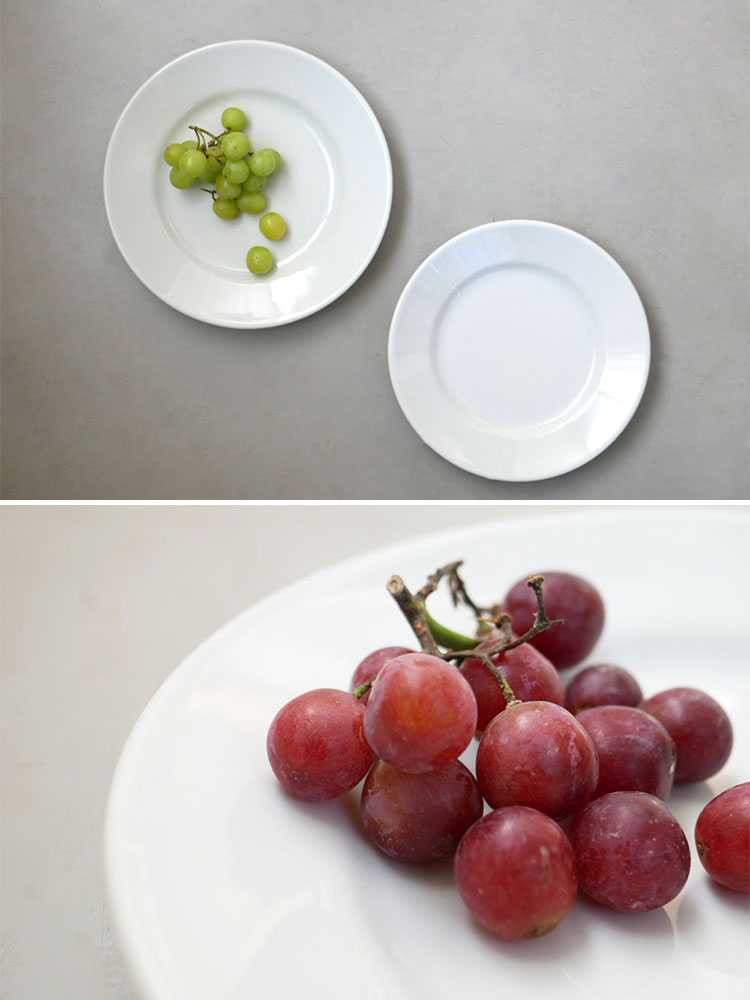 サタルニアのチボリプレートにブドウが載っています